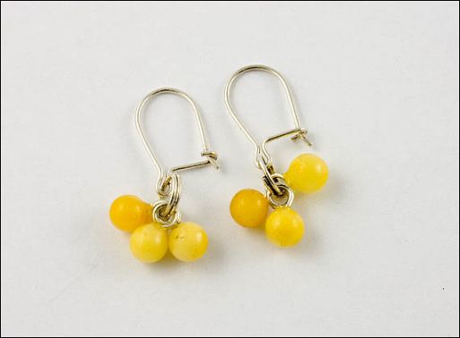 Серьги из мельхиора с янтарём 22794 купить в магазине Самоцветы мира