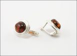 Серьги из мельхиора с янтарём овал 8х10 мм 29886