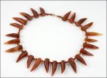 Сердолик колье клыки. Длина 42 см.