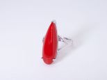 Кольцо из серебра с кораллом красным капля 10х28 мм 46464