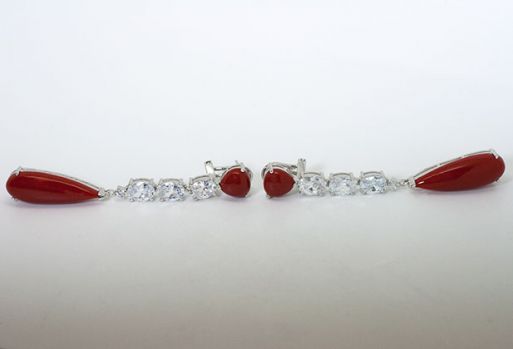 Серебряные серьги с кораллом 46473 купить в магазине Самоцветы мира