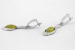 Серьги из мельхиора с янтарём овал 7х10 мм 60888
