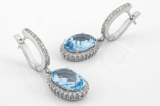 Серебряные серьги с топазом 61242 купить в магазине Самоцветы мира