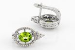 Серьги из серебра с хризолитом и фианитами овал 6х8 мм 61282
