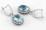 Серьги из серебра с топазом и фианитами овал 9х11мм 61750