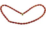 Коралл бусы рис 6*9 мм. Вес 15 гр. Длина 42 см.